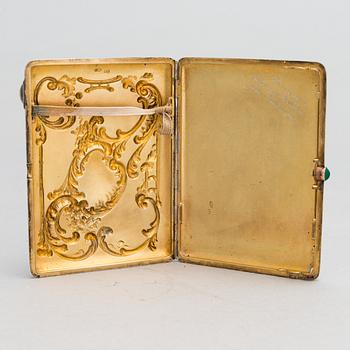 A Russian silver cigarette case, maker's mark of Mikhail Tarasov, Moscow 1908-14.