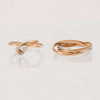 Rings, 2 pcs, 14K gold and round brilliant-cut diamond.