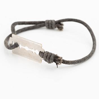 Bracelet, Dinh Van, textile and 18K white gold.