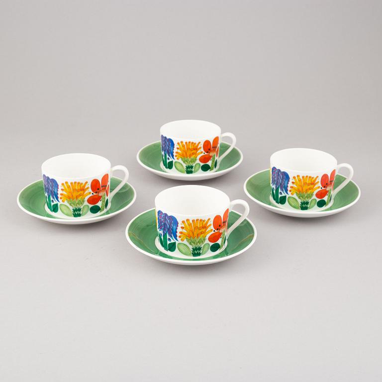 A set of four 'Tahiti' tea cups with plates by Stig Lindberg for Gustavsberg.
