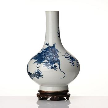 A blue and white dragon vase, Qing dynasty with Xuande six character mark.