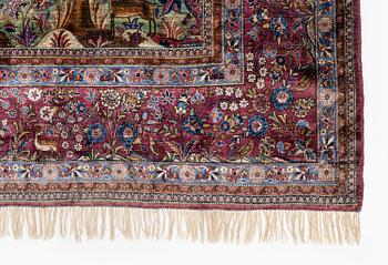 An antique silk Kashan carpet, central Persia, c. 319 x 206 cm.