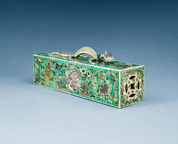 1378. A rare famille verte scroll weight, Qing dynasty.