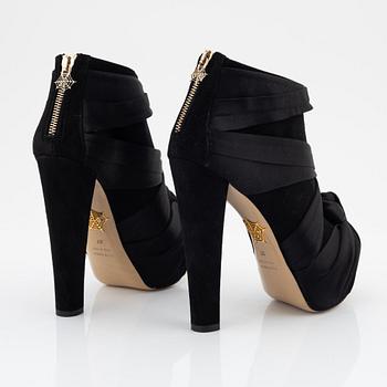 Charlotte Olympia, a pair of black suede and silk platform boots, size 37.