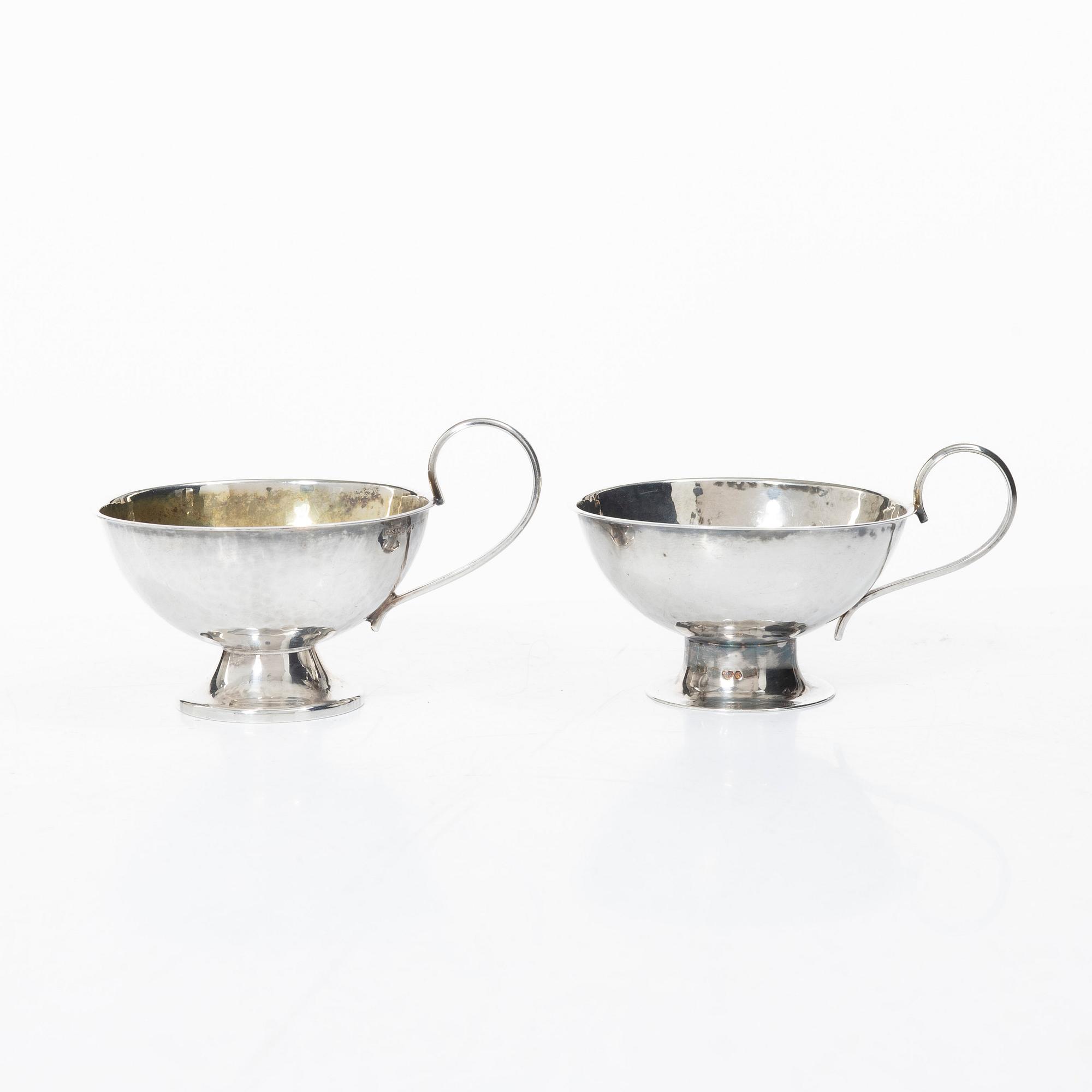 Punchmuggar, 7 st, silver, bl a Cesons, Göteborg 1985.