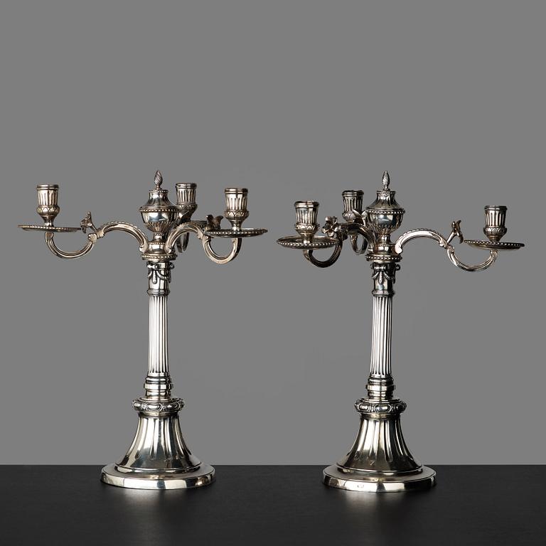 A pair of Gustavian three-light candelabra by Johan Gustaf Ahlgren, Stockholm 1777.