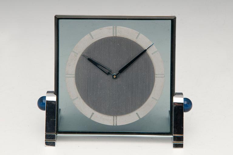 A TABLE CLOCK.