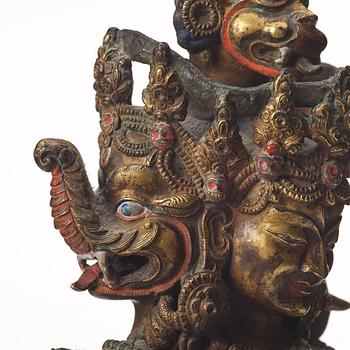 A large Tibetan eight armed deity, probably 20th Century.