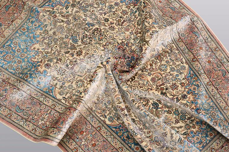 A rug, Figural Oriental silk,  signed, ca 175 x 125 cm.