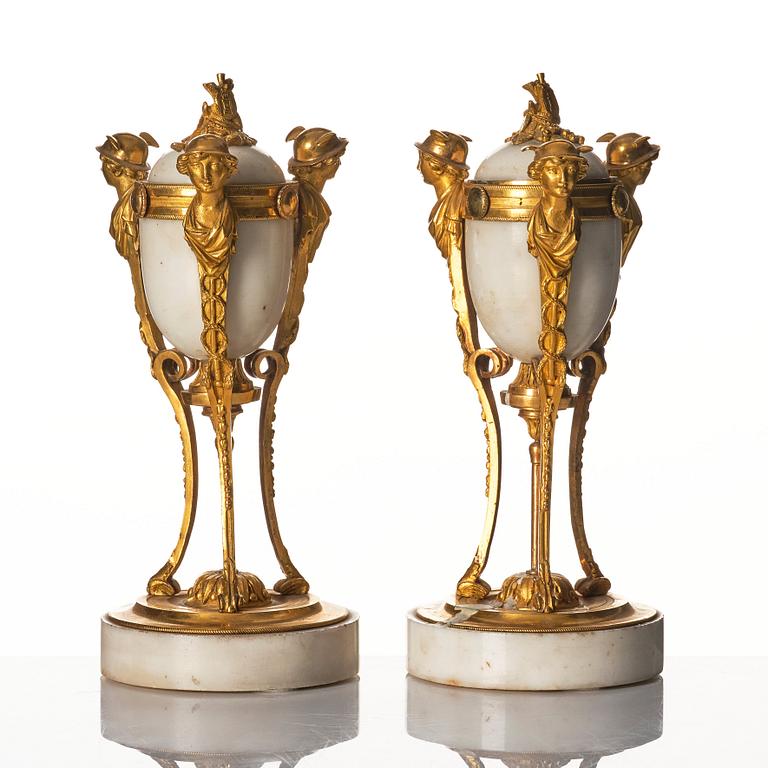 A pair of Louis XVI Cassolettes, white marble and gilt-bronze, around 1790.