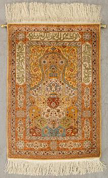 An old/semiantique Hereke silk carpet ca 77 x 53 cm.