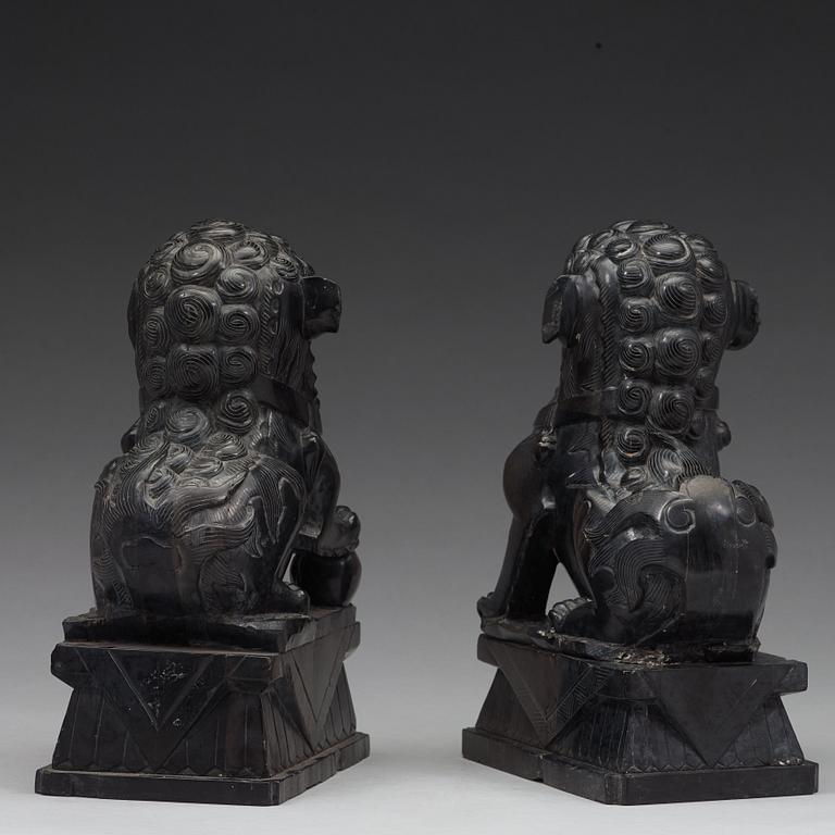 A pair of Chinese buddhist lions in stone, 20th Century.