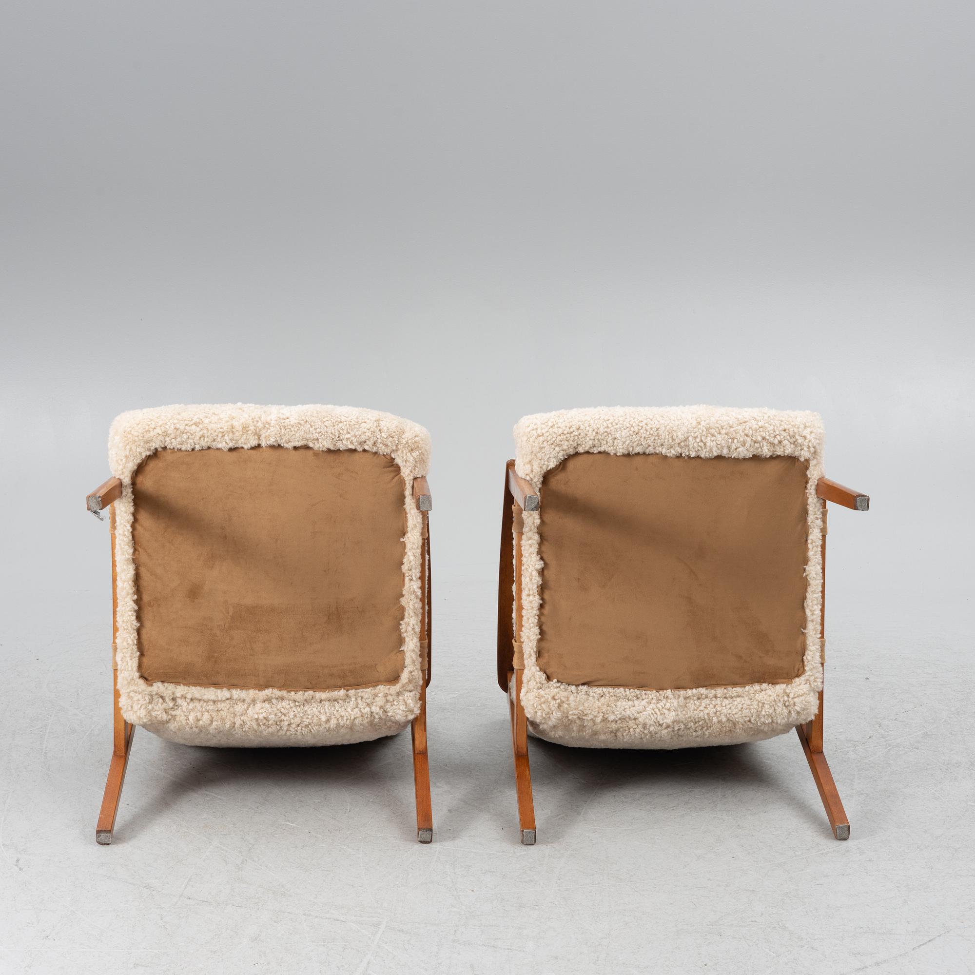 A pair of armchairs, mid-20th century.