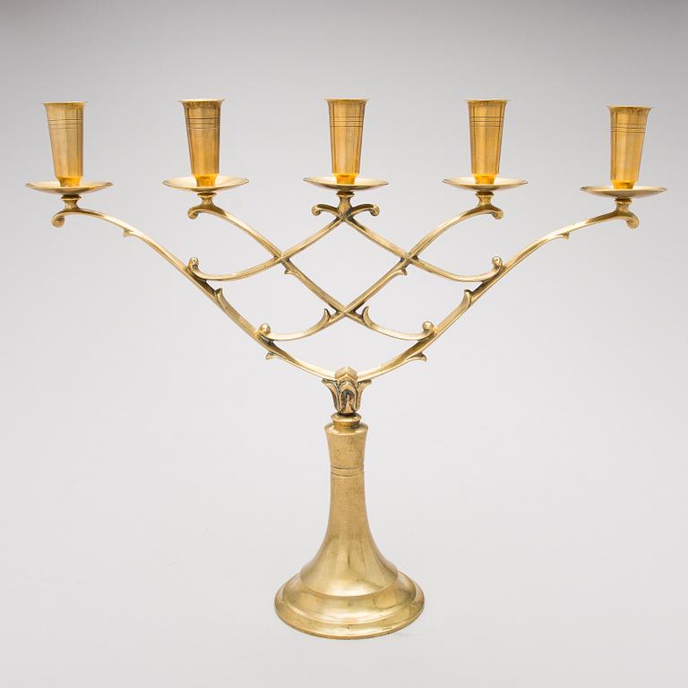 A BRASS CANDELABRUM, Taito, 1920/30s.