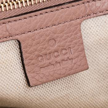 Gucci, a 'Bamboo shopper' bag.