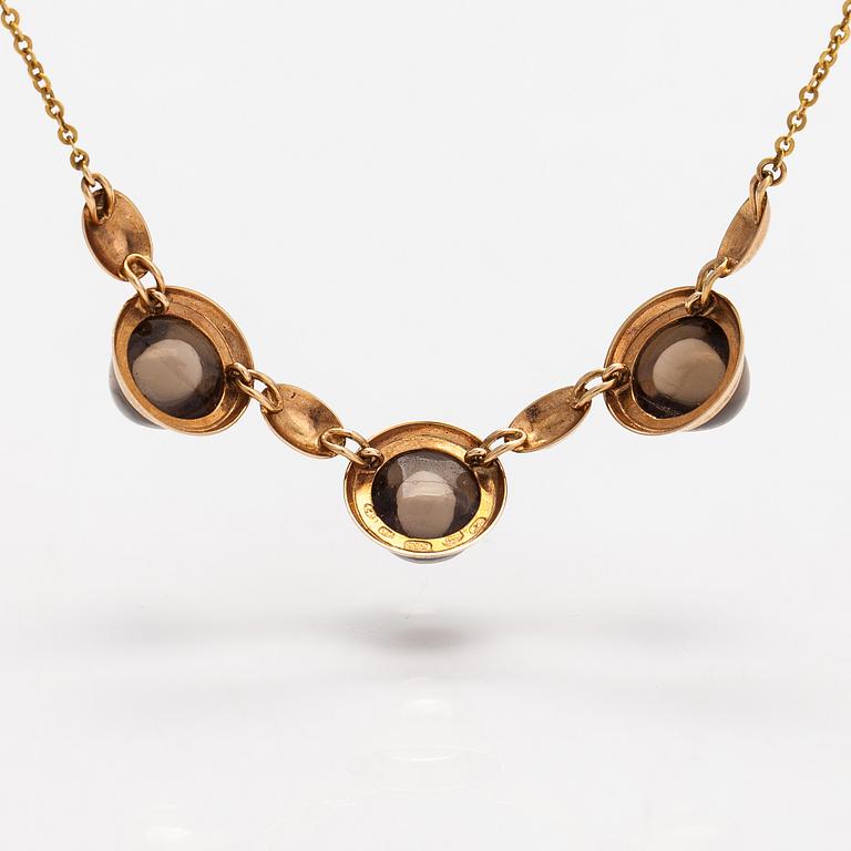 Elis Kauppi, A 14K gold necklace with smoky quartzes. Kupittaan kulta, Turku 1960.