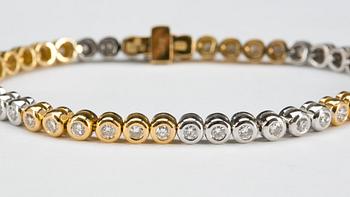 ARMLÄNK, 18k guld -vitguld med briljantslipade diamanter ca 2,35 ct. Vikt ca 15 g.