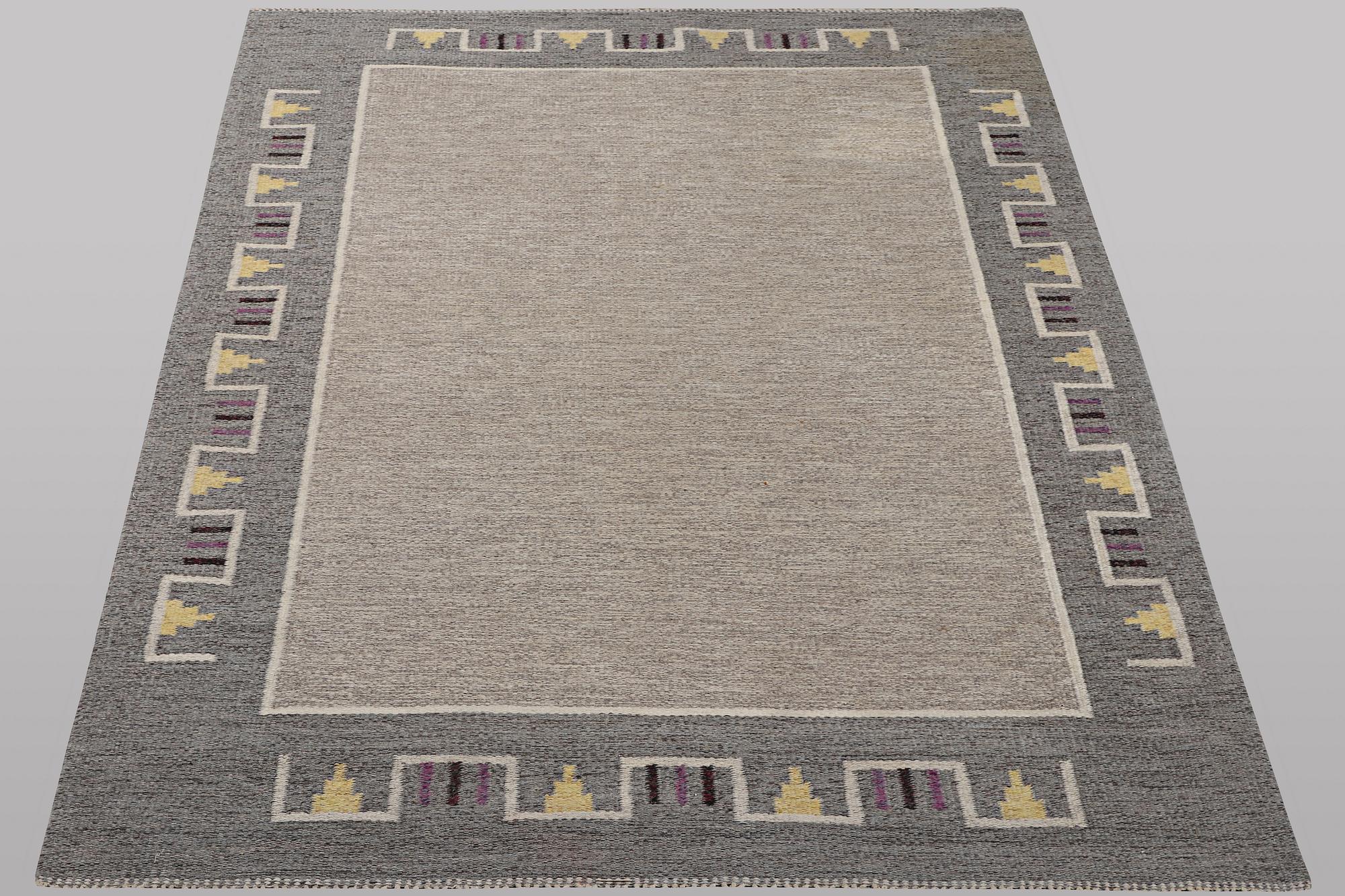 A carpet, flat weave, ca 240 x 165 cm.