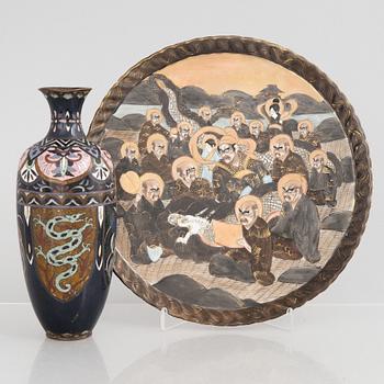A Japanese cloisonné vase and a porcelain 'a thousand faces' satsuma dish, Meiji (1868-1912) and 20th century.