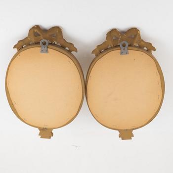 A pair of Gustavian style mirror sconces, mid 20th Century.