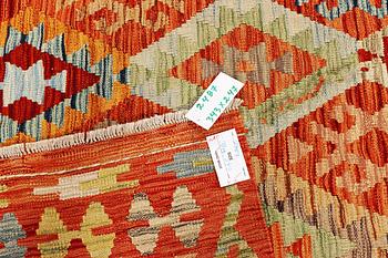A Kilim carpet, c. 343 x 247 cm.