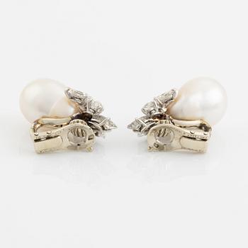 Van Cleef & Arpels a pair of earrings with drop-shaped cultured pearls and marquise and round brilliant-cut diamonds.