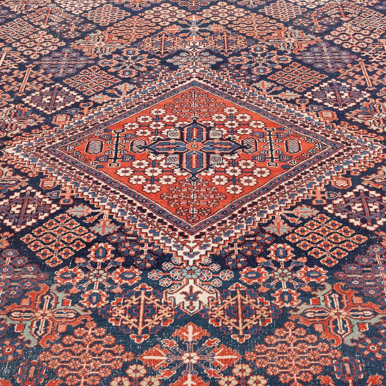 A semi-antique carpet from Joshaghan, around 348 x 190 cm.