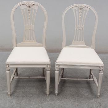 a set of 4+4 gustavian style chairs from the second half of the 20th century.