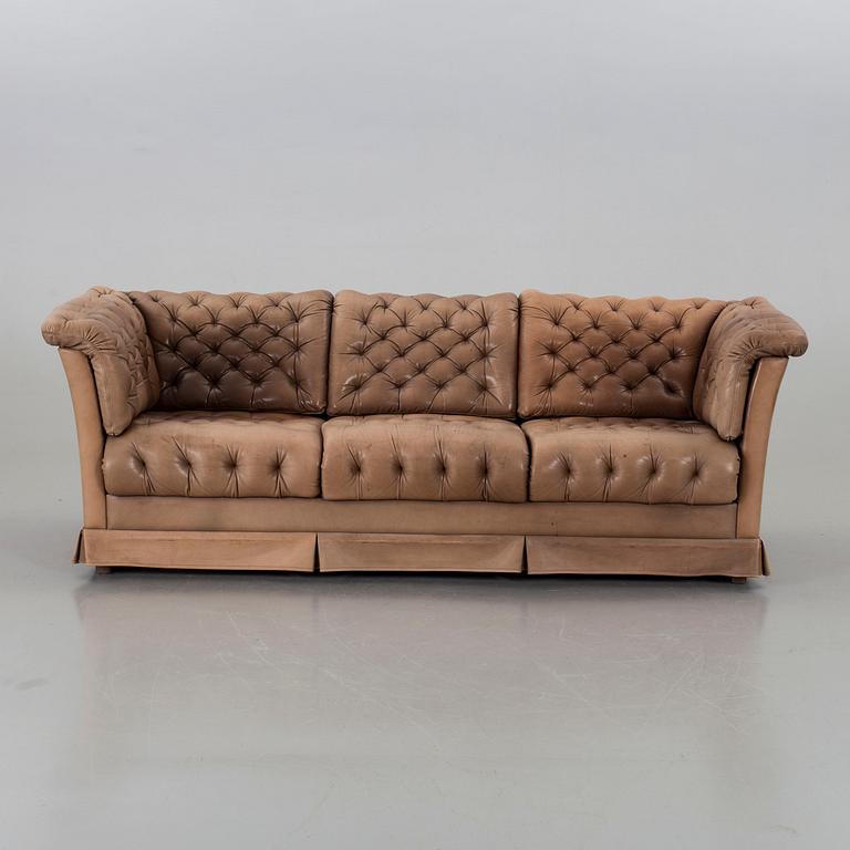 A DUX LEATHER SOFA.