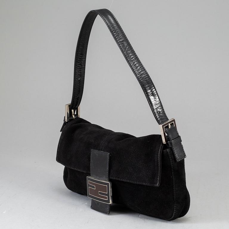 FENDI, a black suede handbag.
