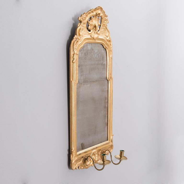 A WALL SCONE/MIRROR, rococo 18th century.