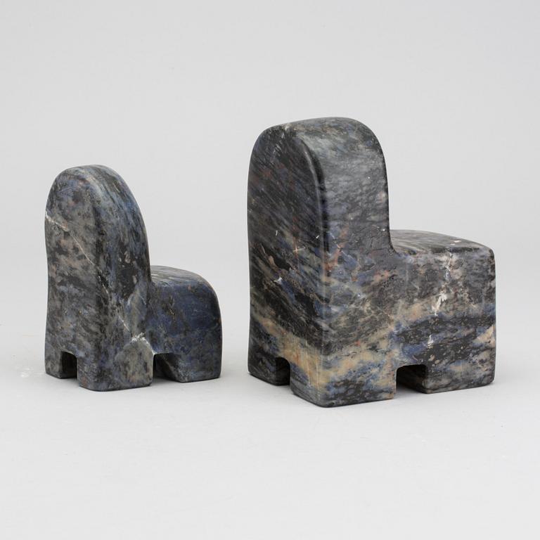POUL ISBAK, a set of two signed and dated sculptures.