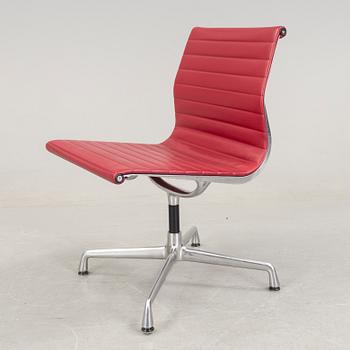 An Aliminium Group chair, model EA105 by Chales and Ray Eamed, produced by Vitra.