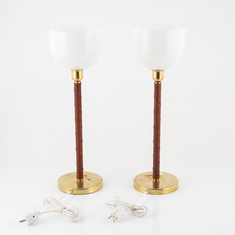 A matched pair of model E 1251 table lamps from ASEA, mid 20th Century.