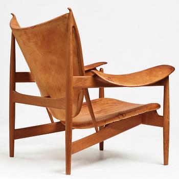 Finn Juhl, a teak and natural brown leather "Chieftain Chair" by Niels Vodder, 1950-60's.