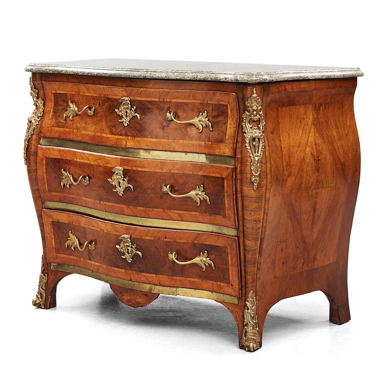 A rococo parquetry and gilt brass-mounted commode by C. Linning (master in Stockholm 1744-79).