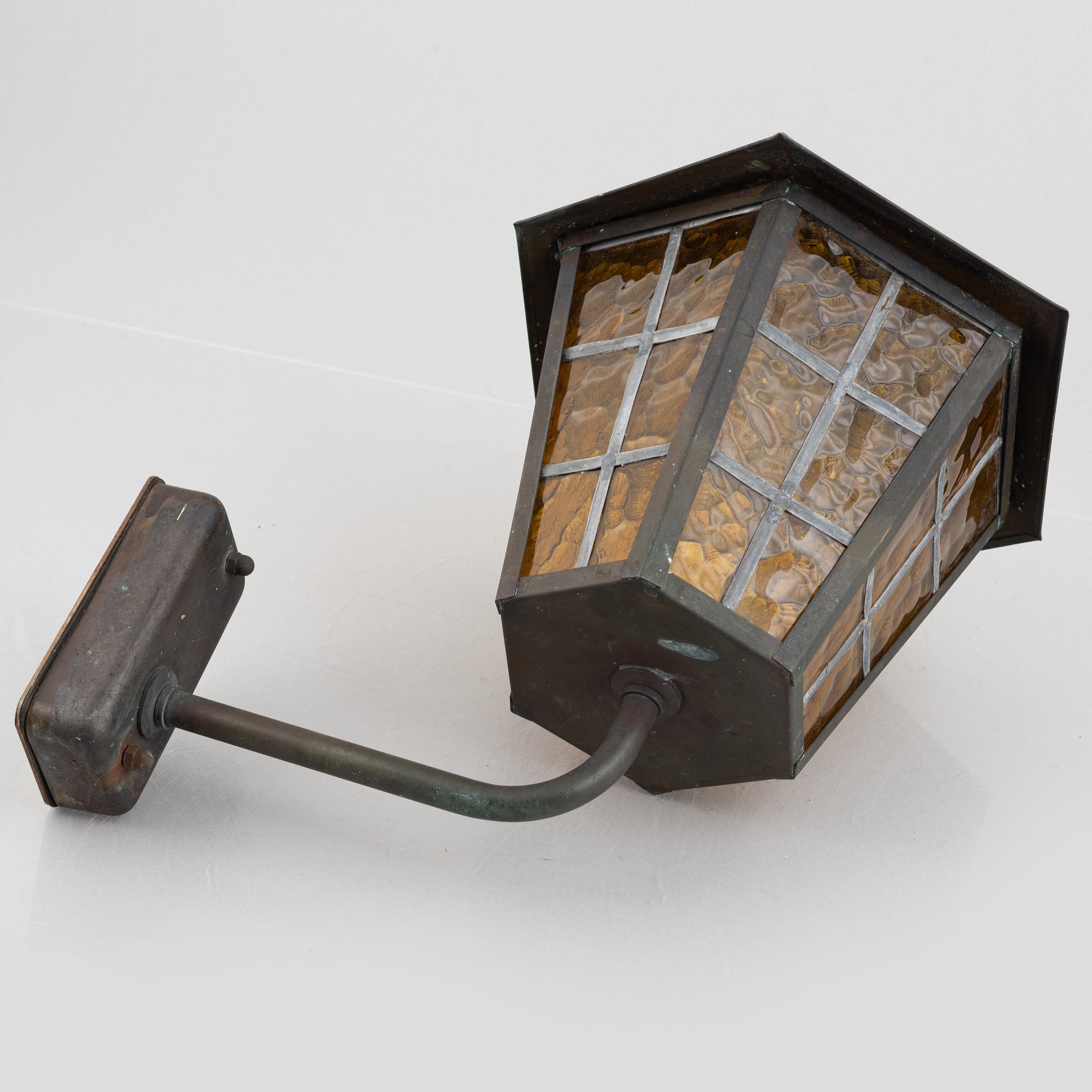 Outdoor lighting, three lamps, likely 1970s.