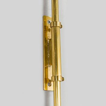 Ilmari Tapiovaara, a 1960s wall light for Metallikolmikko Oy.