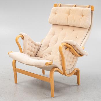 Bruno Mathsson, a 'Pernilla' easy chair and footrest by DUX.