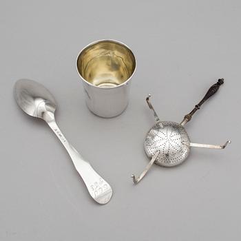 A spoon, a tea spider and a cup in silver, early to late 19th century. Total weight 143 g.