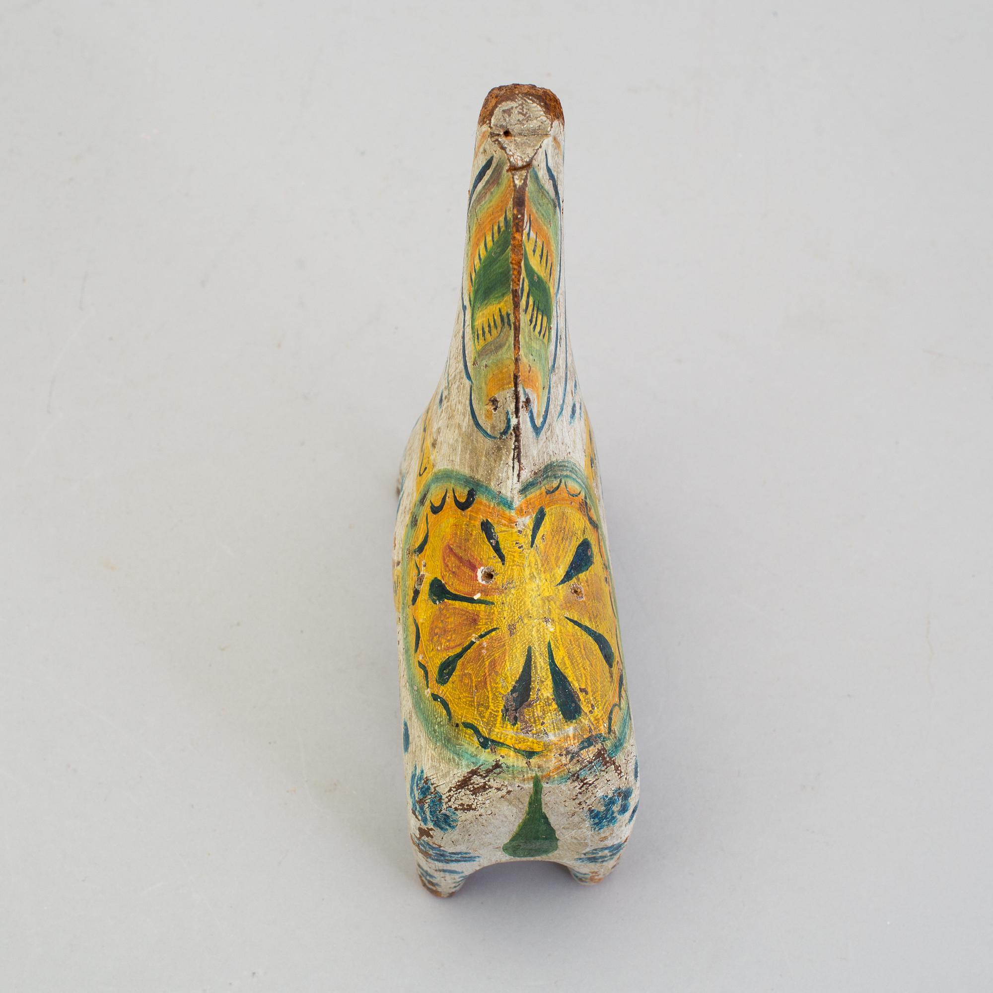 A painted folk art dala horse first half of the 20th century.