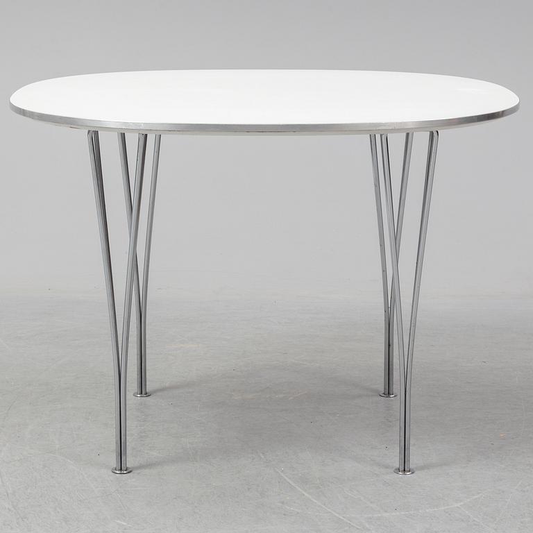 A table by Bruno Mathsson and Piet Hein for Fritz Hansen dated 1990.