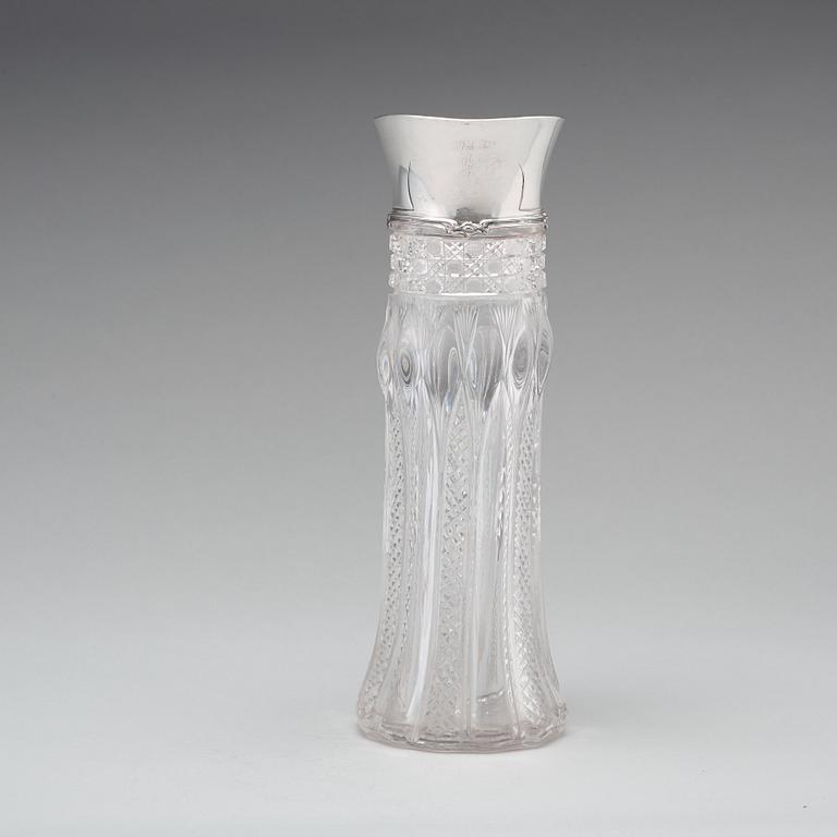 A Tiffany & Co silver and cut glass decanter, circa 1900.