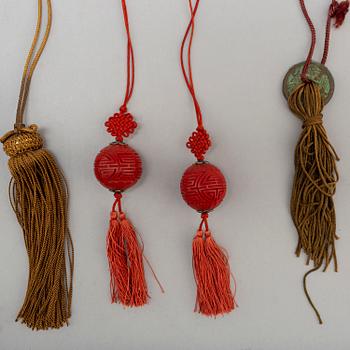 Eight (6+2) tassles, porcelain and bronze, Japan, 20th century.