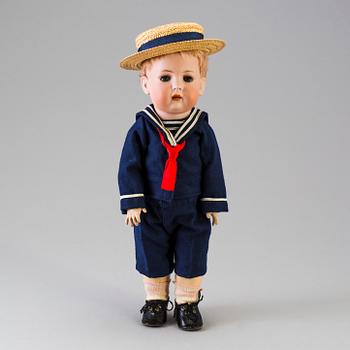 A bisque head boy doll by Baehr & Proeschild for Bruno Schmidt, Germany, ca 1920.