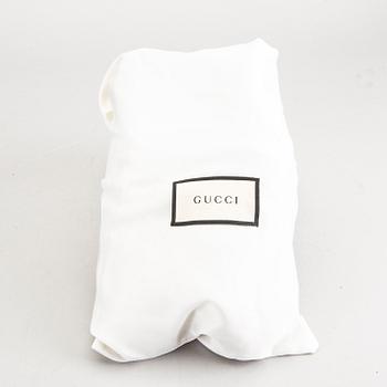 A piar of Gucci sneakers, size 37 1/2.