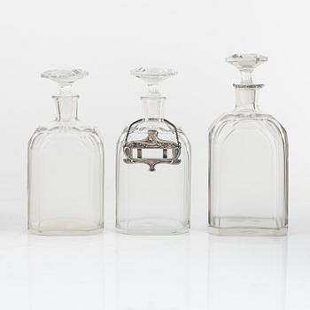 A box with three glass bottles, first half of the 19th Century.