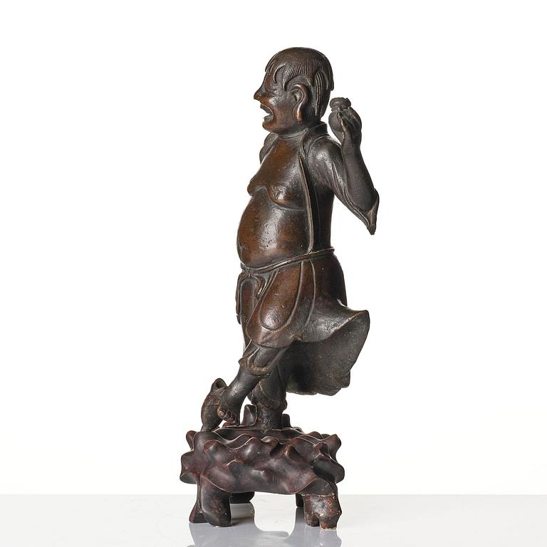 A bronze sculpture of Liu Hai, Qing dynasty, 19th century.