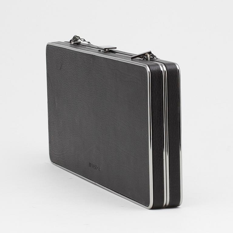 JIL SANDER, an black evening bag/clutch.