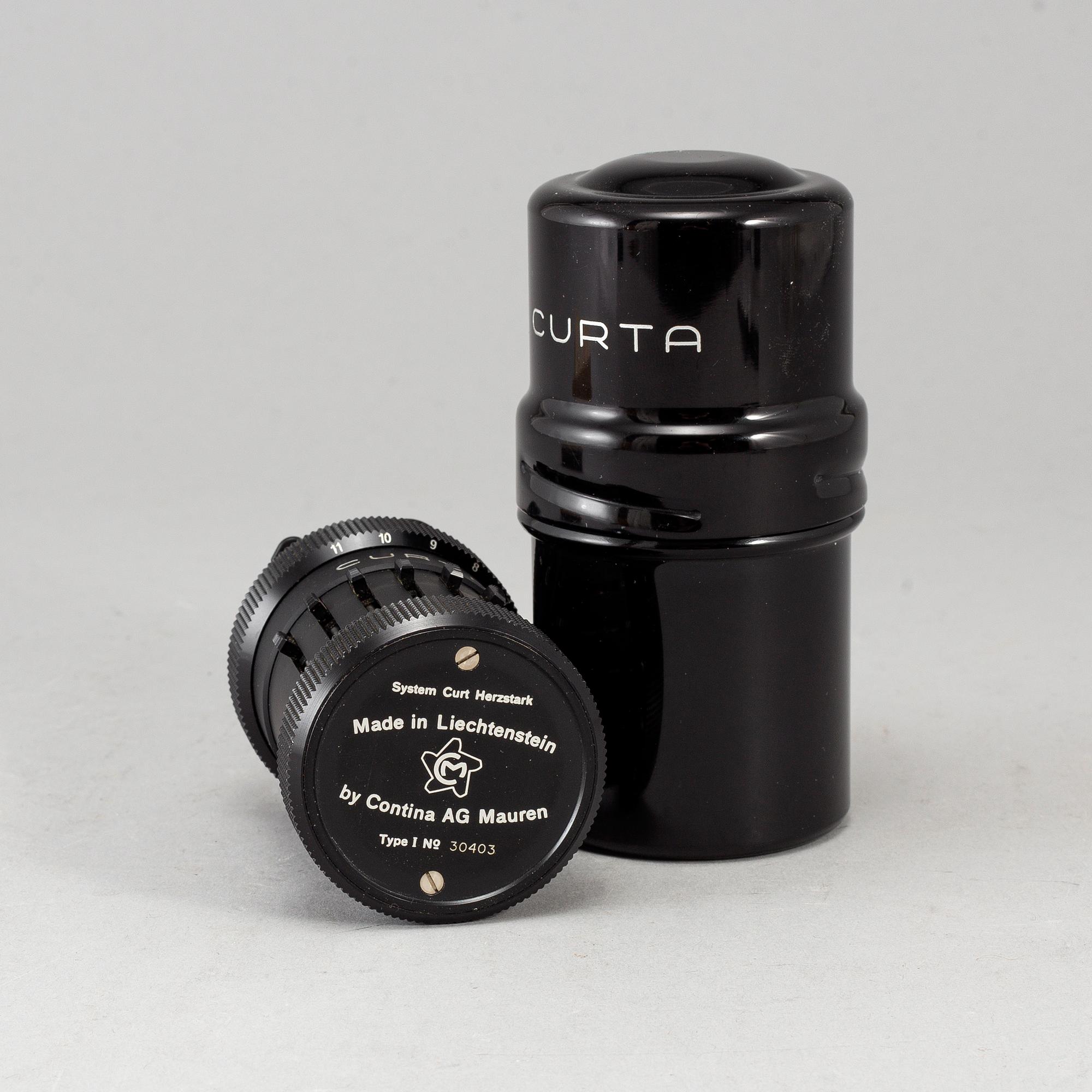 A 'Curta, Type I' calculator developed by Curt Herzstark, Contina AG Mauren, Lichtenstein, designed in 1947.